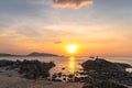 During the sunset, some people come to rest. Some come fishing on the rocks