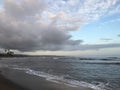 Sunset in Spring at Black Sand Beach in Kekaha on Kauai Island, Hawaii - Niihau Island in Horizon. Royalty Free Stock Photo