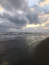 Sunset in Spring at Black Sand Beach in Kekaha on Kauai Island, Hawaii - Niihau Island in Horizon. Royalty Free Stock Photo