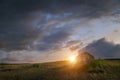 Sunset in the steppe, a beautiful evening sky with clouds, plato Ukok, no one around, Altai, Siberia, Russia.