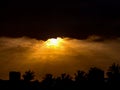 Sunset after a stomy day  where clouds are moving towards the sun Royalty Free Stock Photo