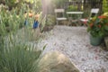 Sunset stone garden with empty bistro coffee table
