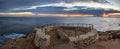 Sunset in a stone overlook that views Crystal Cove State Park Be