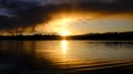 Sunset Storm Clouds Over Lake Pine Trees Wilderness Royalty Free Stock Photo