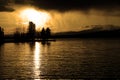 Sunset Storm Clouds Over Lake Pine Trees Wilderness Royalty Free Stock Photo