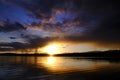 Sunset Storm Clouds Over Lake Pine Trees Wilderness Royalty Free Stock Photo