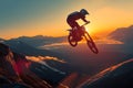 Sunset stunt motorbike rider jumps across mountain slope, silhouette against dusk