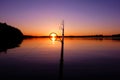 Colorful sunset and a fishing rod Royalty Free Stock Photo