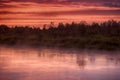 Sunset summer rain on river Royalty Free Stock Photo