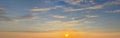 Sunset sun on golden sky with cloud. Sunrise horison skyline background Royalty Free Stock Photo