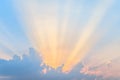 Sunset. Sun rays over the low clouds. Royalty Free Stock Photo