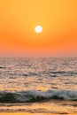 Sunset Sun Shine Above Sea. Natural Sunrise Sky Warm Colors Over Ripple Sea. Ocean Water Foam Splashes Washing Sandy Royalty Free Stock Photo