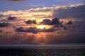 Sunset and Sunbeams through Tropical Clouds Formation over Acapulco Bay