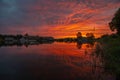 Sunset, sunrise above the Medzhybizh Castle, Ukraine. Lake and purple clouds. Turkish rule and later Polish period, Kiev Rus. Royalty Free Stock Photo