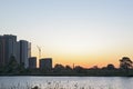 Sunset or sunrise in the city. Modern residential district near the pond of Saint Petersburg, Russia, Kupchino Royalty Free Stock Photo