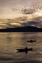 Sunrise with reflections at Lake Toba, Samosir Island, Indonesia. Royalty Free Stock Photo