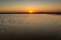 Sunset or sunrise on salt lake Baskunchak (Russia