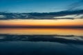 Sunset or sunrise on salt lake Elton (Russia) with mirror Royalty Free Stock Photo