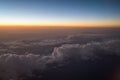 Sunset or sunrise viewed from airplane Royalty Free Stock Photo