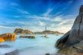 Ke Ga Lighthouse sunset with surf patted smoother reefs create clouds on the sea Royalty Free Stock Photo