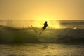 Sunset surfer falling Royalty Free Stock Photo
