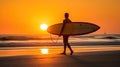 Sunset surfer on a pristine beach. Silhouette with surfboard at the ocean shoreline. Royalty Free Stock Photo