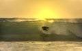 Sunset surfer in the wave Royalty Free Stock Photo
