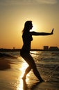 Sunset Tai Chi on a beach Royalty Free Stock Photo