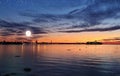 Sunset Tallinn Old town Panorama starry night and moon on sky,summer night seascape city light reflexion on water in harbor ,B