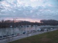 Sunset on the TamiÃÂ¡ quay in Pancevo. A column of parked boats on the river Tamis.