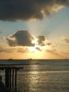 sunset at tamiyang bay pier in indonesia