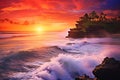 Sunset at Tanah Lot temple in Bali island, Indonesia, Seascape, ocean at sunset, Ocean coast with waves near Uluwatu temple at Royalty Free Stock Photo