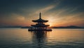 asian buddhist temple built in the middle of a large lake at sunset Royalty Free Stock Photo