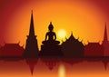 Sunset with Thai Buddha temple and riverside.Asian lifestyle