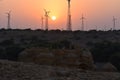 Sunset with modern windmills in badabaag jaisalmer Rajasthan India Royalty Free Stock Photo