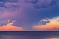Sunset thunderstorm clouds raining around Lake Hefner Royalty Free Stock Photo