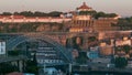 Sunset time, shadow cover Douro riverside with the Dom Luiz bridge timelapse, Porto , Portugal. Travel background Royalty Free Stock Photo