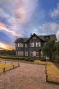 Sunset on Tokyo Metropolitan Park KyuFurukawa`s old western-style mansion at red maple momiji leaves season in autumn