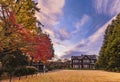 Sunset on Tokyo Metropolitan Park KyuFurukawa`s old western-style mansion at red maple momiji leaves season in autumn Royalty Free Stock Photo