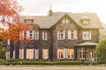 Sunset on Tokyo Metropolitan Park KyuFurukawa`s old western-style mansion at red maple momiji leaves season in autumn Royalty Free Stock Photo