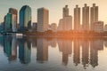 Sunset tone, city office building over water reflection Royalty Free Stock Photo