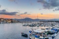 Sunset in Torre del Greco port near Naples, on background Sorrento peninsula