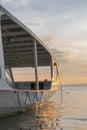 Sunset with tourist boat and still water on Gili Air Island, Ind