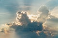 Sunset with towering cumulus clouds and a flock of bird in the f Royalty Free Stock Photo