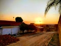 Sunset by the town, an amazing moment Royalty Free Stock Photo