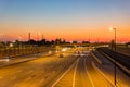 Sunset traffice over Highway 40 and cityscape Royalty Free Stock Photo