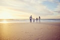 Sunset, travel and family holding hands on beach walking on holiday, summer vacation and weekend. Nature, mockup and Royalty Free Stock Photo