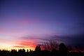 Sunset With Trees Silhouetted in the Colors Royalty Free Stock Photo
