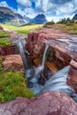 Sunset at Triple Falls in Glacier National Park, Montana, USA Royalty Free Stock Photo