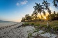 Sunset on the tropical beach with traditional wood boat, palm trees and white sand in Diani beach, Watamu Kenya and Zanzibar, Tanz Royalty Free Stock Photo
